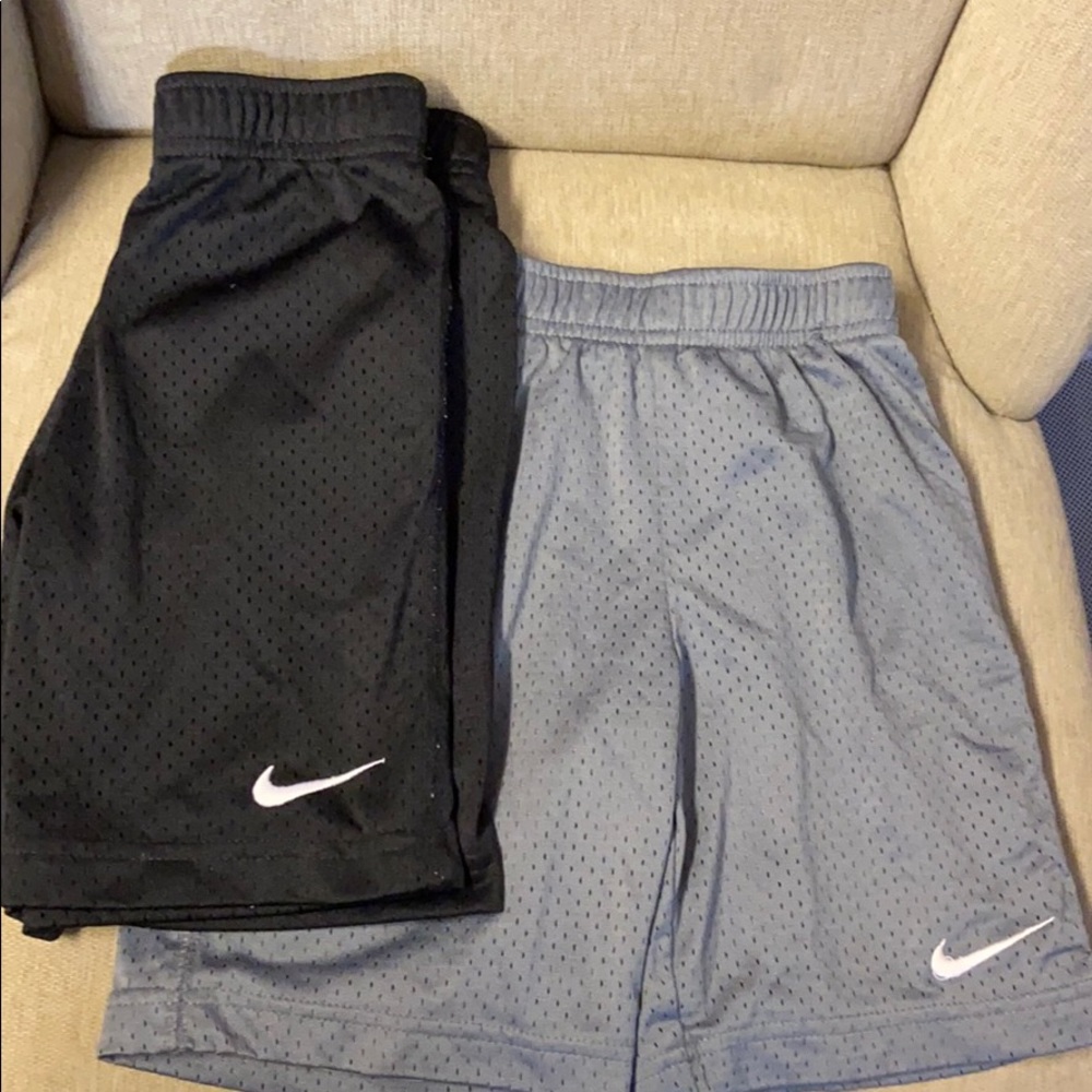 Two pair of boys Nike shorts